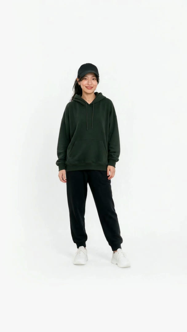 JiHee in a green hoodie and black cap